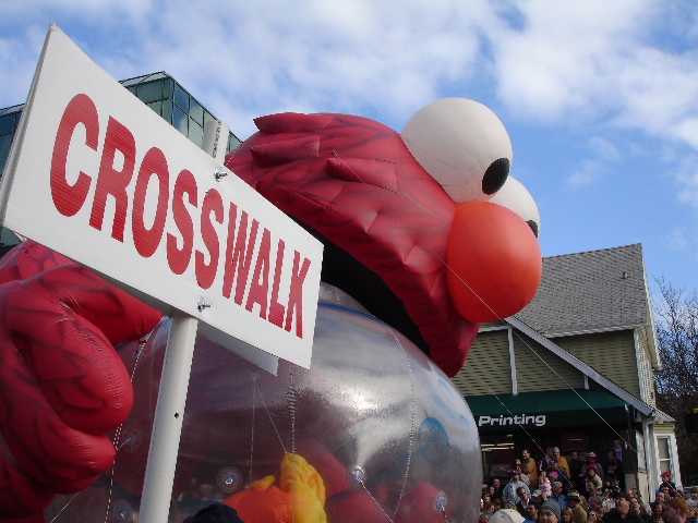 Crosswalk Crossing, Limbo Dancing Characters Seen with Santa in Stamford