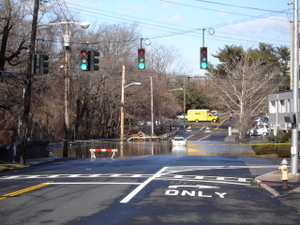 (PHOTO: Ah, 2007 Flood Damage Being Fixed. Consideration of a resolution to appropriate $1.7 million from the Capital Projects Reserve account to complete the reconstruction of the flood damaged retaining wall on Blind Brook at Theodore Fremd. Roll Call.)