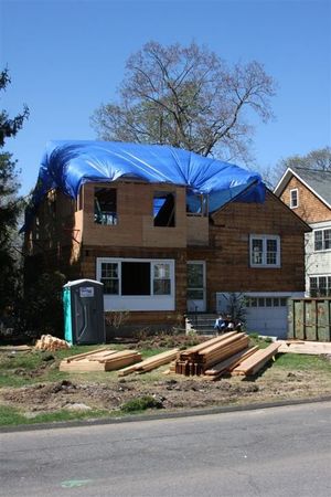 04-11-2010 290 outside of house w blue tarp over roof