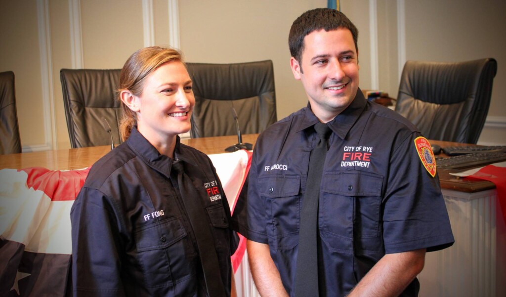 (PHOTO: Rye Fire Fighter Cea Fong and Fire Fighter Ryan M. Iarocci at their swearing in at Rye City Hall on September 9, 2016. Source: Rye FD.)