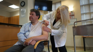 County Boss and Rye Resident Latimer Gets Flu Shot