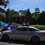 Midland School Graduation Car Parade June 2020 2 Kids in Midland Shirts