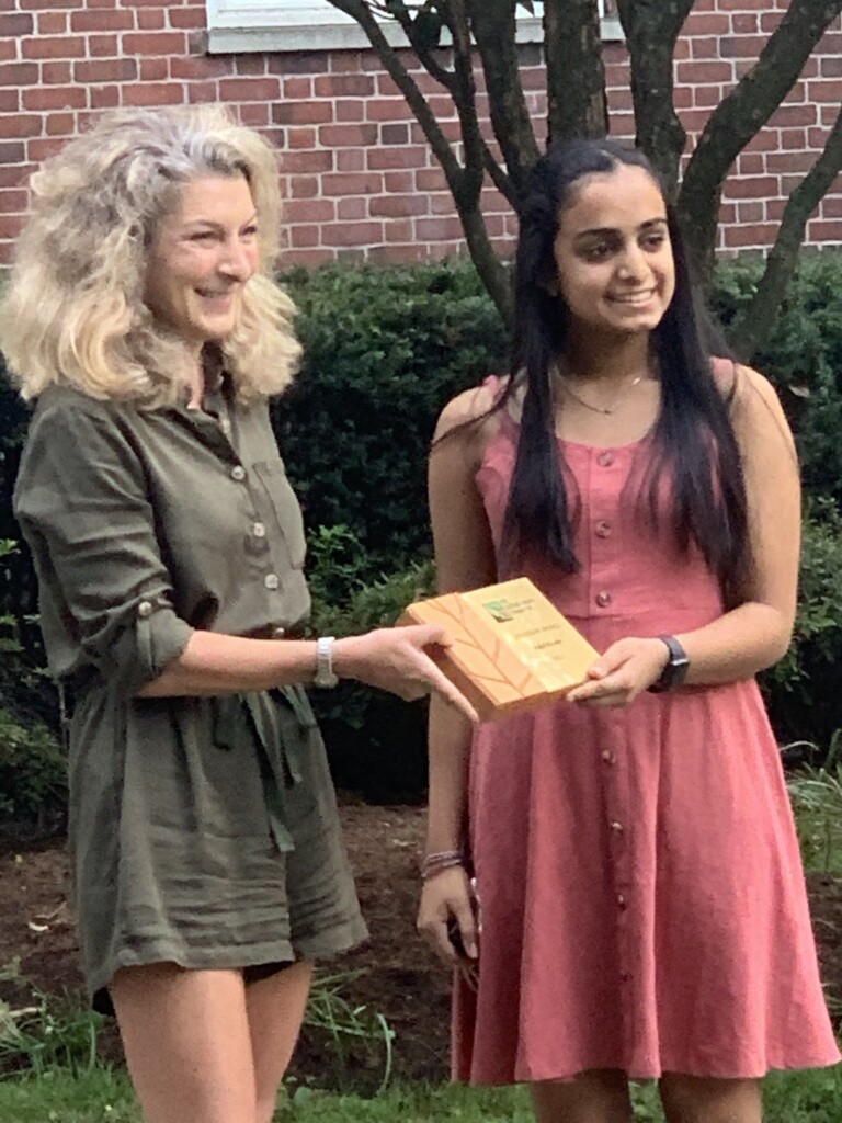 Former Rye Sustainability Committee Chair Melissa Grieco presenting the 2020 Rye Sustainability Committee Leadership award in the youth category to Kajol Khatri.