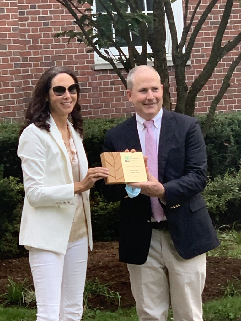 John Krall, Executive Chef, accepting on behalf of Manursing Island Club the 2020 RSC Leadership award in the nonprofit category from Rye Sustainability Vice-Chair Gretchen Kaye-Crowley.