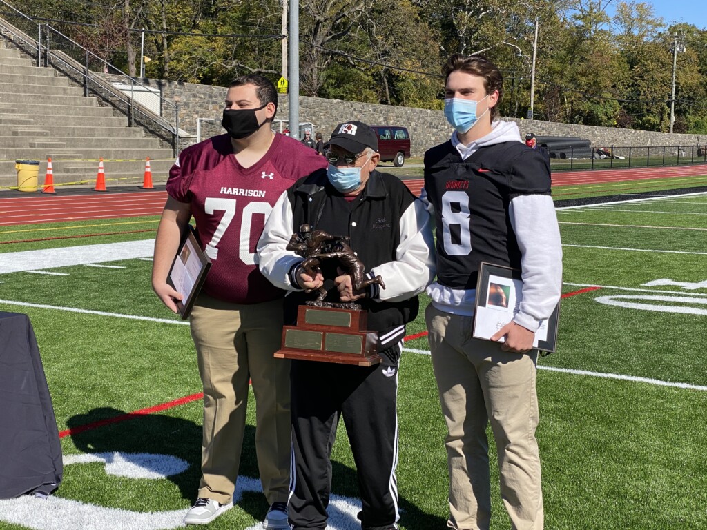 Huskie TJ Ciafone, Doug Mello and Garnet Jack Griffiths