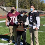 Huskie TJ Ciafone, Doug Mello and Garnet Jack Griffiths