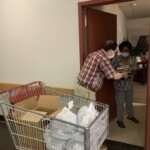 Juan delivering the meals to elderly residents in his building - 2