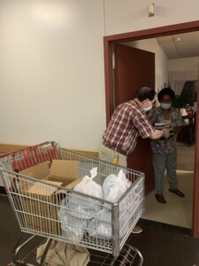 Juan delivering the meals to elderly residents in his building - 2