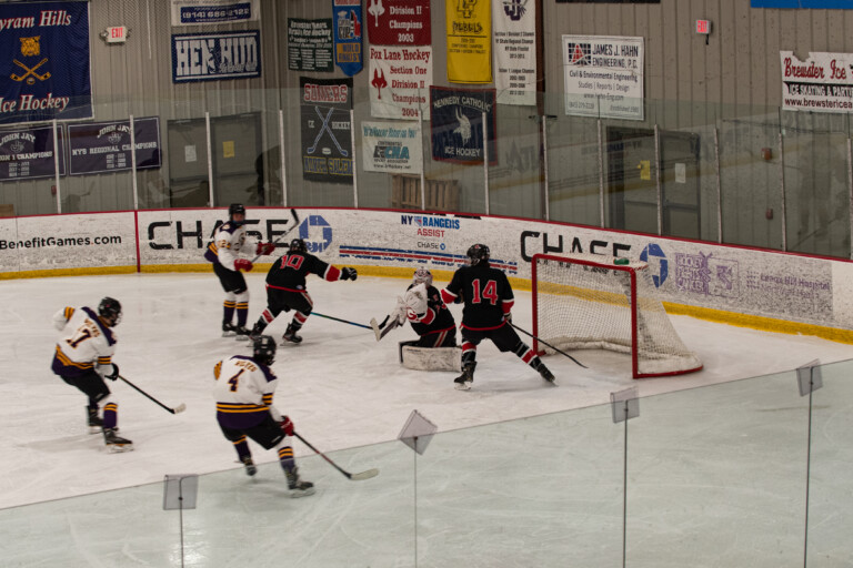 Garnet's goaltender Anabelle Thomas makes a save against John Jay 02-24-202