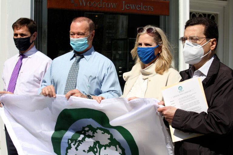 Michael and Robert Woodrow of Woodrow Jewelers, Patti Capparelli of the Rye Sustainability Group, Rye Mayor Josh Cohn