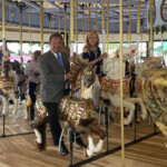 Giddy-up. George and Robin Latimer on the historic Grand Carousel at Rye Playland on June 25, 2021.