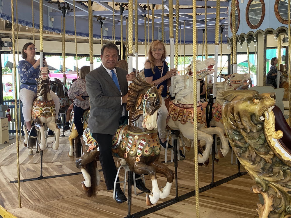 Giddy-up. George and Robin Latimer on the historic Grand Carousel at Rye Playland on June 25, 2021.