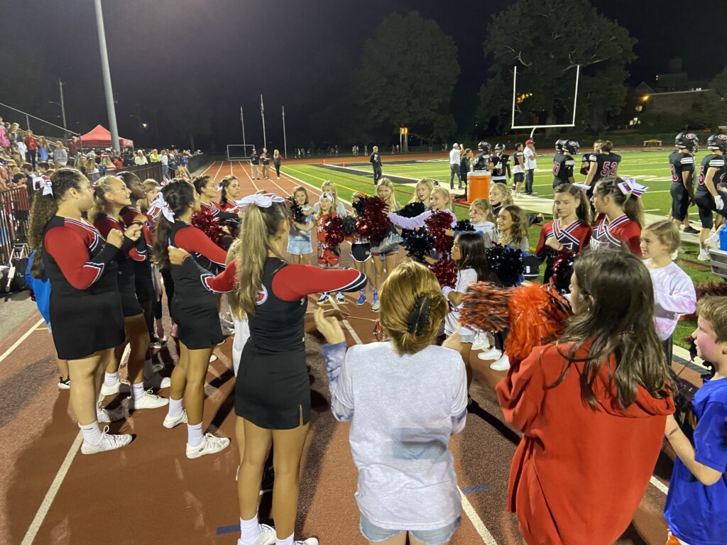 Rye Girls Varsity Cheerleading at Football vs. Sleepy Hollow 2021-09-25