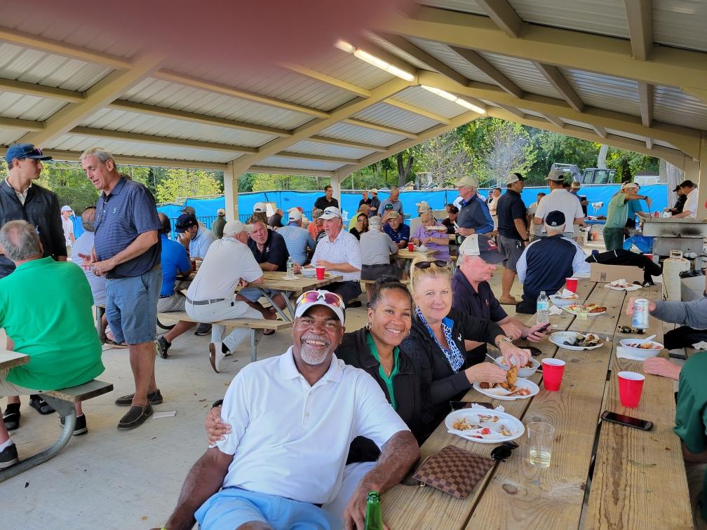 (PHOTO: Golf outing attendees enjoyed a picnic too. Left to right: Mike Kennedy, Greta Lee, JoAnne Salvio.)