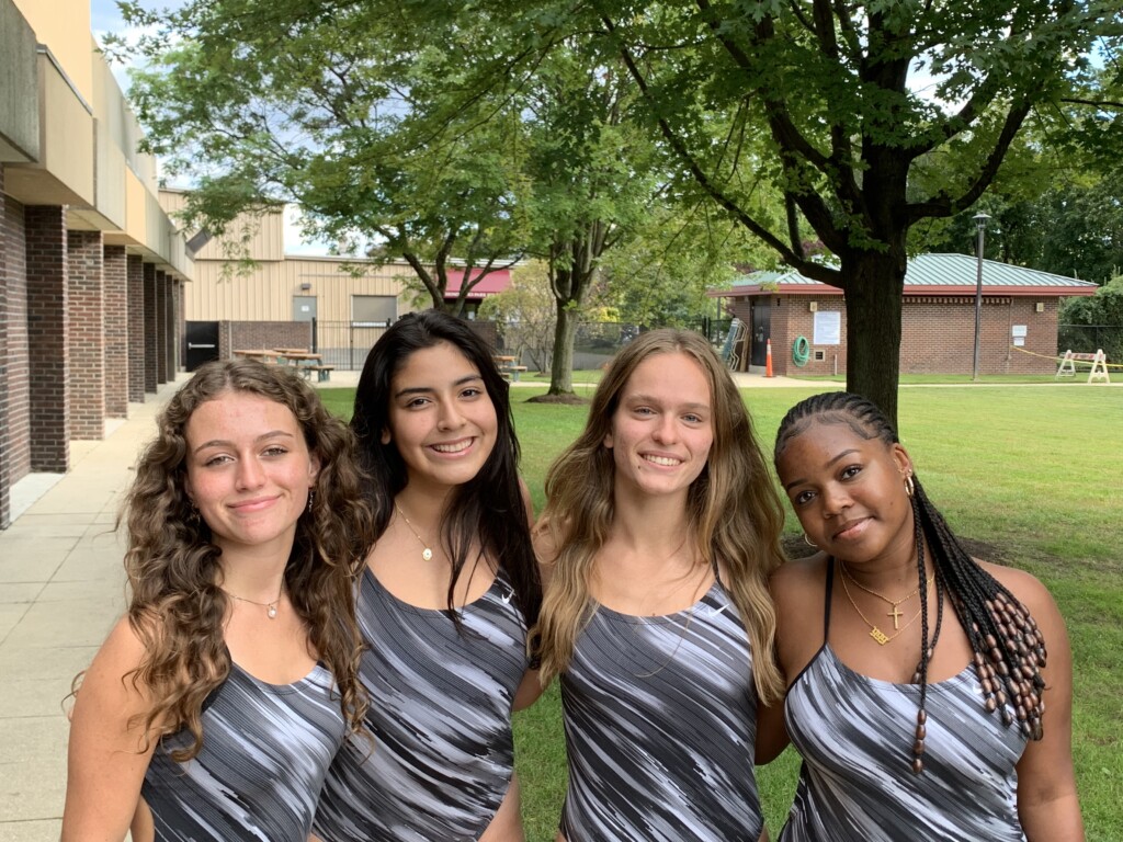 (PHOTO Rye Girls Swimming & Diving seniors.) 2021-10