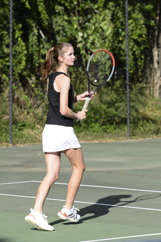 (PHOTO: Warming up for her match against Pelham at Disbrow Park, MVP Cassidy Pagen prepares to hit a backhand in mini tennis.)