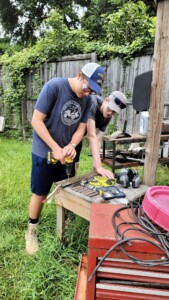 (PHOTO: Morgan Kaplan at work during the Rye Presbyterian Church New Orleans Youth Group mission last summer.)