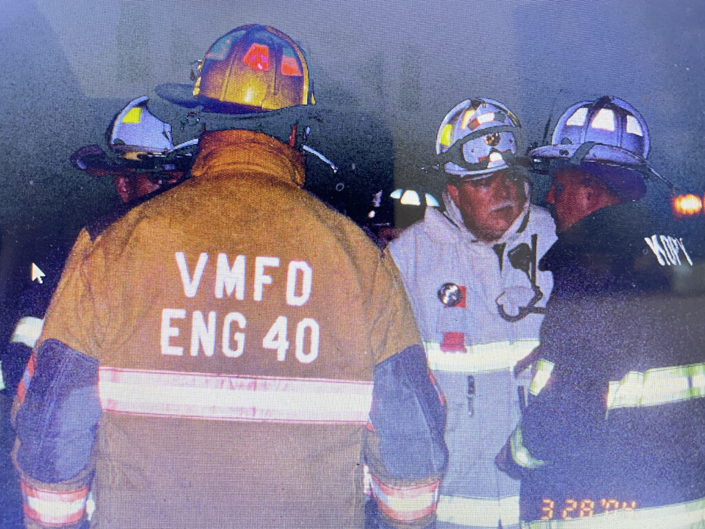 (PHOTO: Kopy, far right, during his term as fire chief in Mamaroneck in 2004. The department was responding to a large fire at 604 Tompkins Avenue in Mamaroneck. Kopy is seen speaking to Pete Cotter, the former Rye fire chief. Rye was there on mutual aid.)