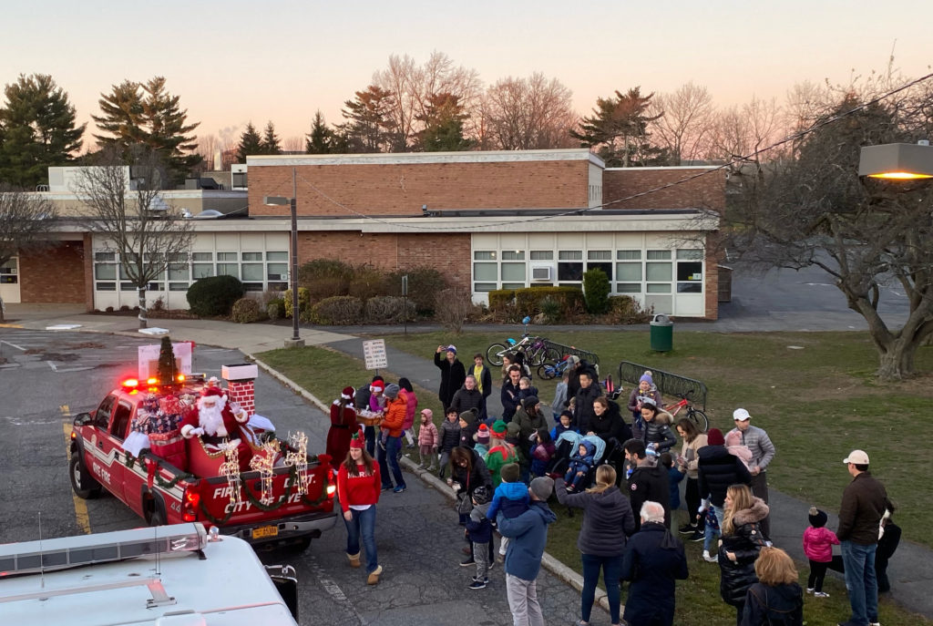(PHOTO: The Rye FD annual candy cane run brought Santa Claus to the Osborn Elementary School.)