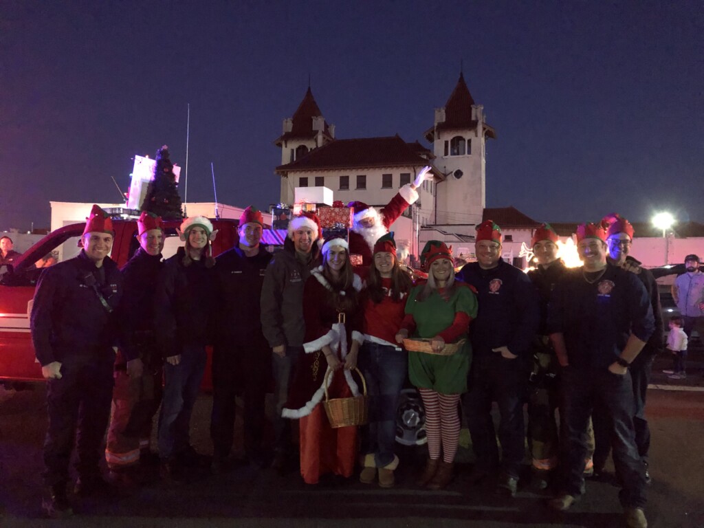 (PHOTO: Rye FD members with Santa, Ms. Claus and one of the Elves during the annual candy cane run on December 12, 2021.)