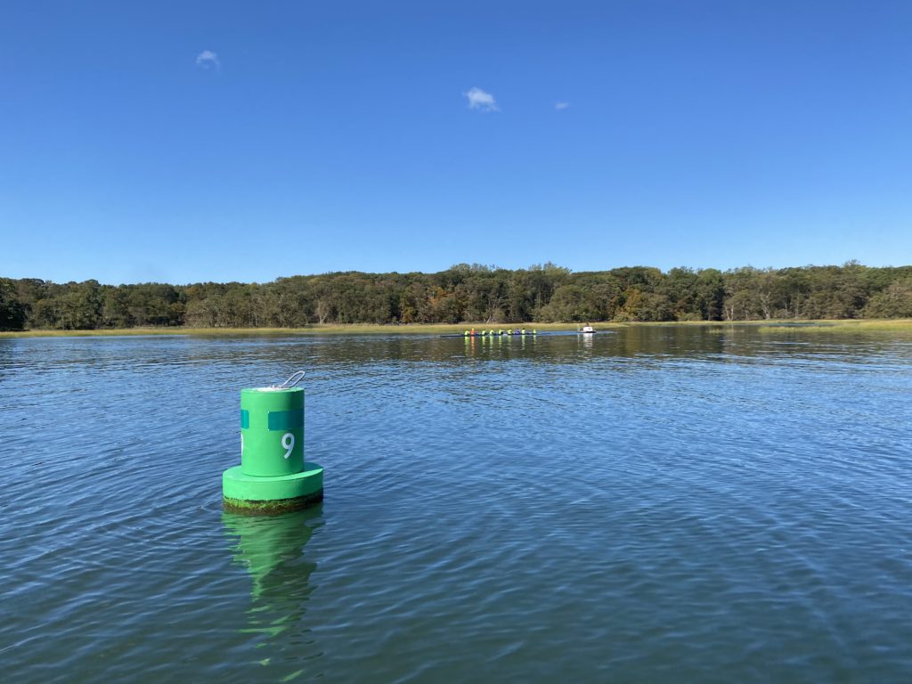 (PHOTO: Buoy 9 in Milton Harbor. Rowers from RowAmerica Rye can be seen in the background.)