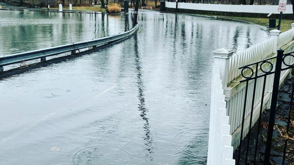 (PHOTO: Flooding from winter storm Izzy on Kirby Lane approaching the Mill Tide Boat Basin.)