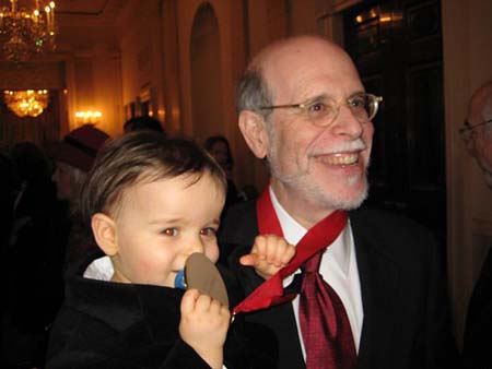 (PHOTO: Holzer poses with his grandson Charles after receiving the National Humanities Medal at the White House in 2008. Credit: HaroldHolzer.com)