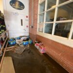 (PHOTO: Damage inside Rye FD HQ from Hurricane Ida. You can see the high water mark on the wall.)