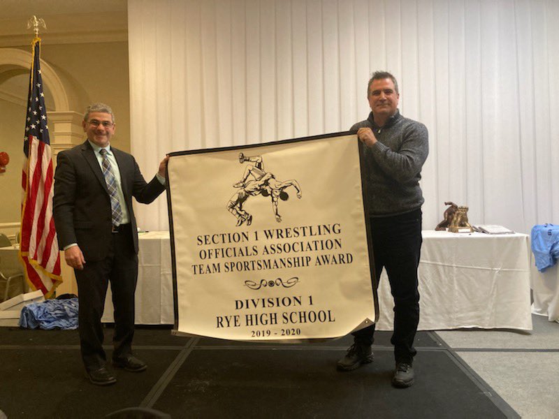 (PHOTO: Section One Wrestling Chair and Valhalla AD Jamie Block with Rye Boys Varsity Wrestling Coach Brian Scher.)