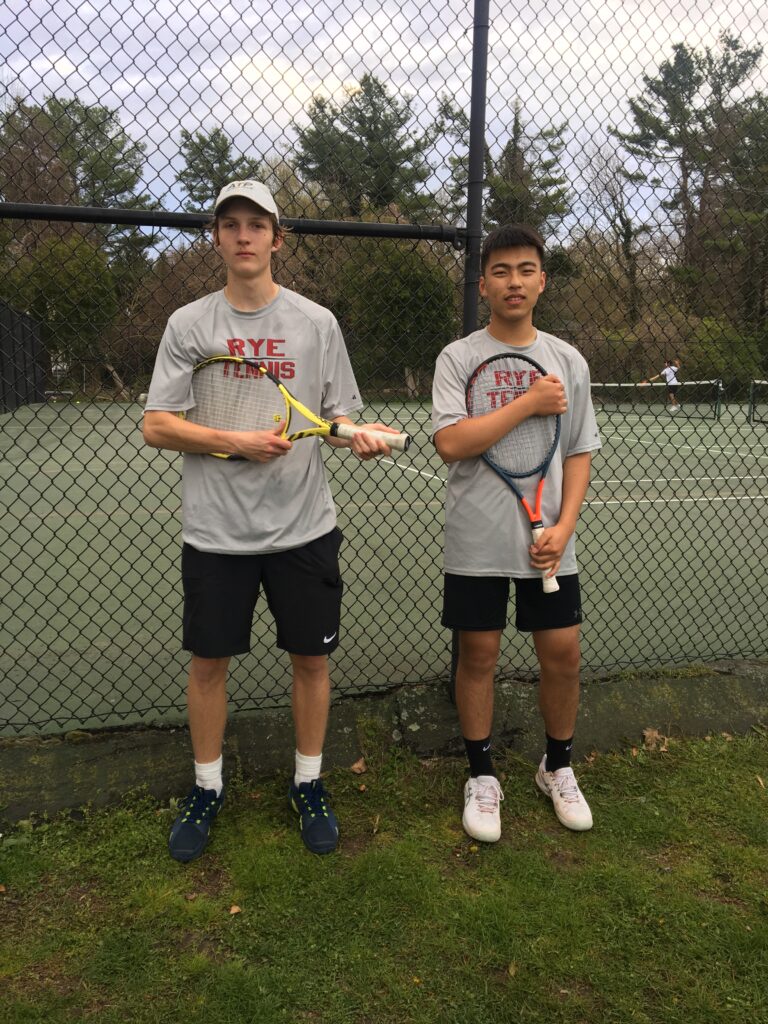 (PHOTO: The Gunnar Wey and Jaiwen Hao win at second doubles clinched the match Tuesday at Pelham.)