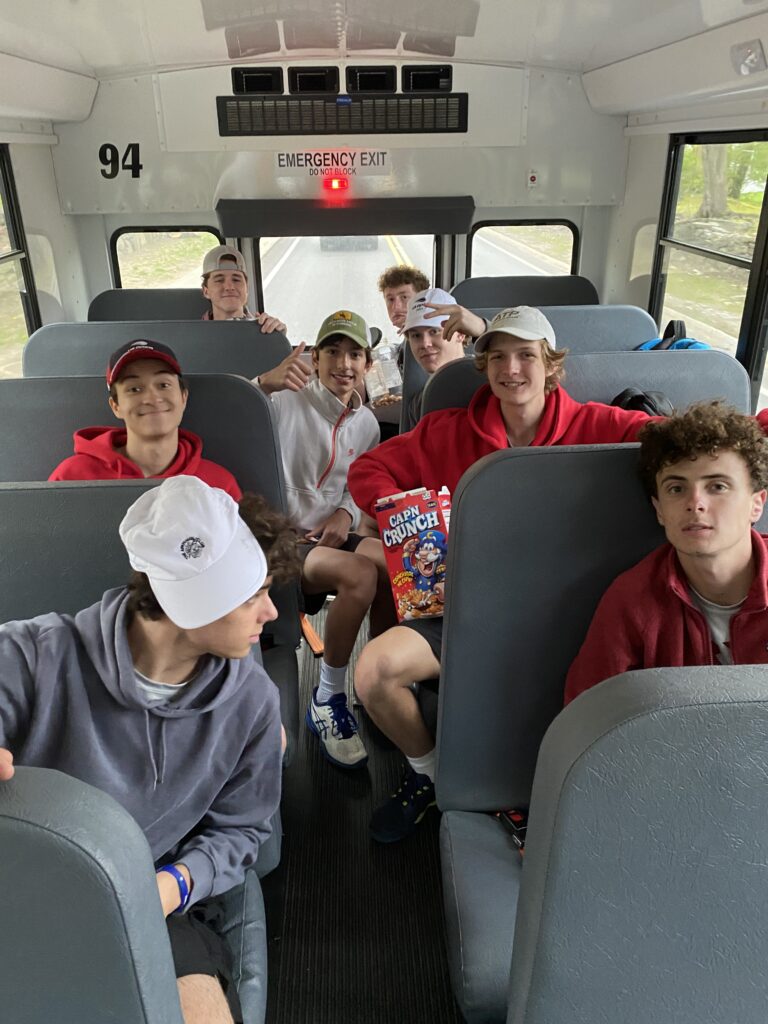 (PHOTO: Victory and Captain Crunch on the bus ride home Tuesday for Rye Boys Varsity Tennis.)