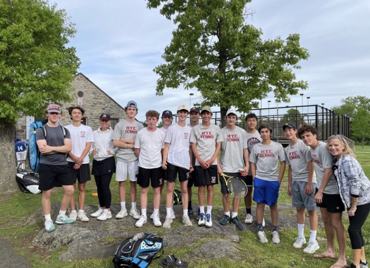 (PHOTO: The Rye Boys Varsity Tennis team unified and happy despite a season ending loss.)