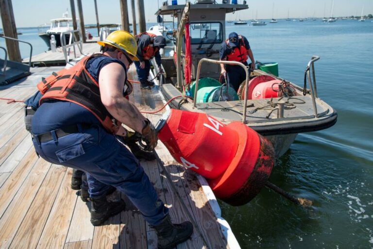 (PHOTO: A Coast Guard Aids to Navigation Team (ANT) New York boat crew temporarily disestablishes buoys from Milton Harbor, New York, June 6, 2022. Due to significant shoaling in the area, the depth of water has become too shallow for Coast Guard crews to regularly access and service the buoys. Private aids to navigation will mark the channel until dredging is complete. Credit: U.S. Coast Guard photo by Petty Officer 3rd Class Ryan Schultz)