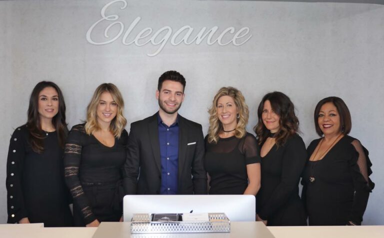 (PHOTO: The Elegance Salon staff: Master Colorist Lisa Williams, Senior Stylist Michelle Giorgio, owner Danny Babayev, (unidentified), Master Stylist Dawn Rossi and Stylist Martha Ramirez.)