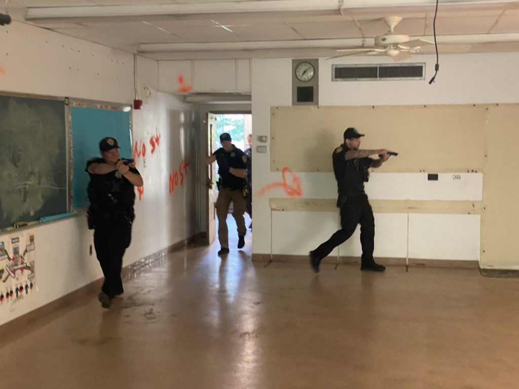 (PHOTO: Rye PD conducted active shooter training on the Rye High School and Middle School campus on Sunday, June 26, 2022. 1- 3/8)