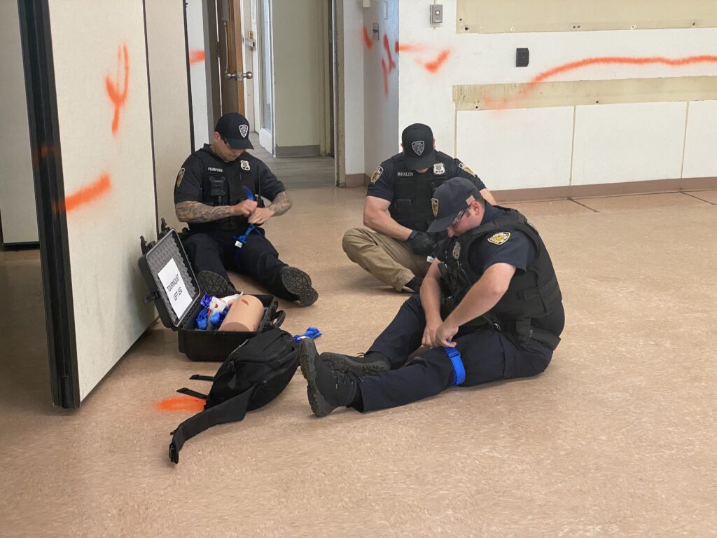 (PHOTO: As part of the training, Rye PD officers must know first aid, including how to apply tourniquets on themselves in the event they are shot. 1- 8/8)