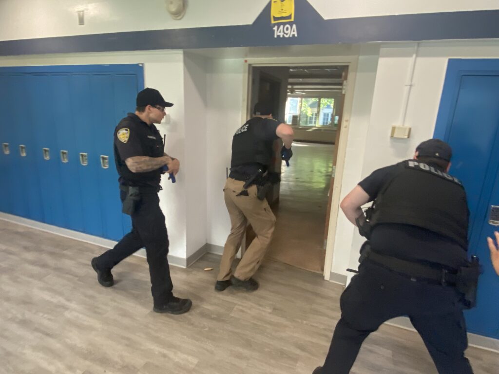 (PHOTO: Rye PD conducted active shooter training on the Rye High School and Middle School campus on Sunday, June 26, 2022. 3- 4/8)