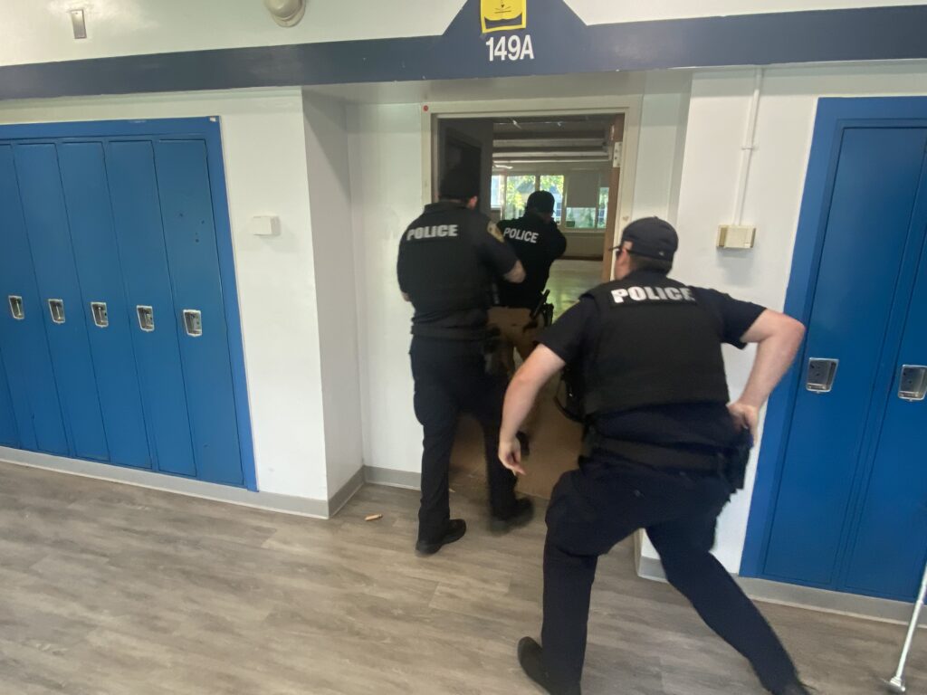 (PHOTO: Rye PD conducted active shooter training on the Rye High School and Middle School campus on Sunday, June 26, 2022. 3- 5/8)