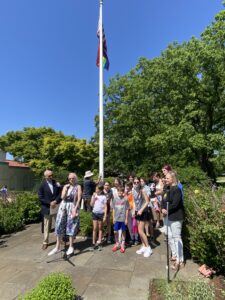 (PHOTO: The second annual pride flag raising at Rye Town Park.)