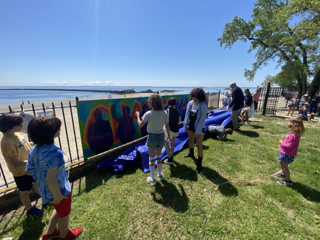 (PHOTO: The pride community art mural was unveiled at Rye Town Park on Saturday.)