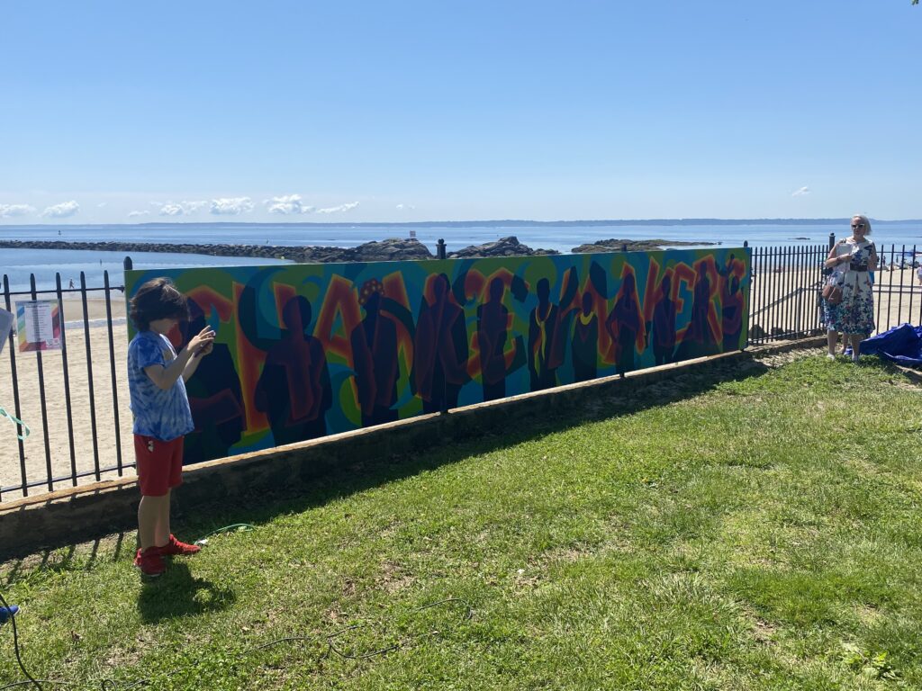 (PHOTO: The pride community art mural was unveiled at Rye Town Park on Saturday.)