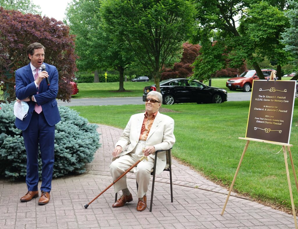 (PHOTO: Osborn President and CEO Matthew G. Anderson with Dr. Edward C. Pasciuti at the ceremony in The Osborn’s Betty Neagle Garden.)