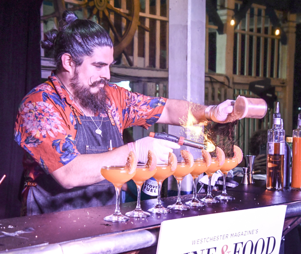 (PHOTO: Westchester Magazine’s Wine & Food Festival Party on the Pier at Playland features the 4th Annual Bartender Shake-Off.)