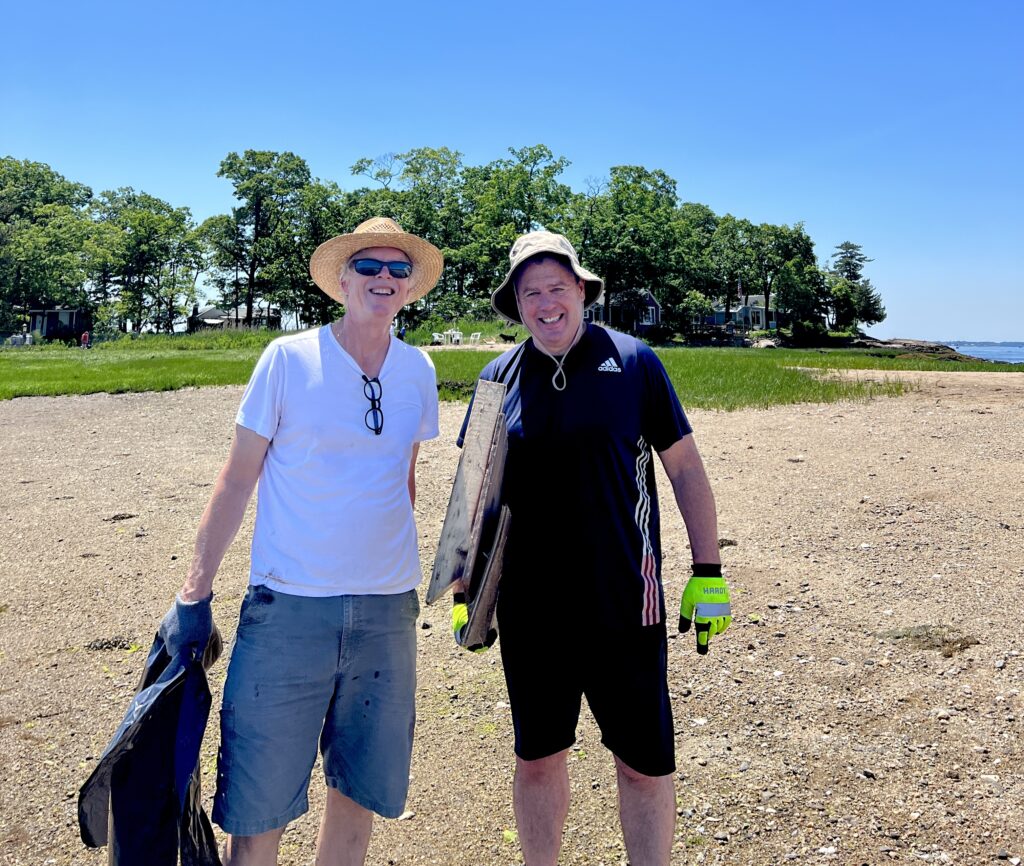 (PHOTO: Bob Clyatt and Tim Murphy during the Hen Island beach cleanup in June.)