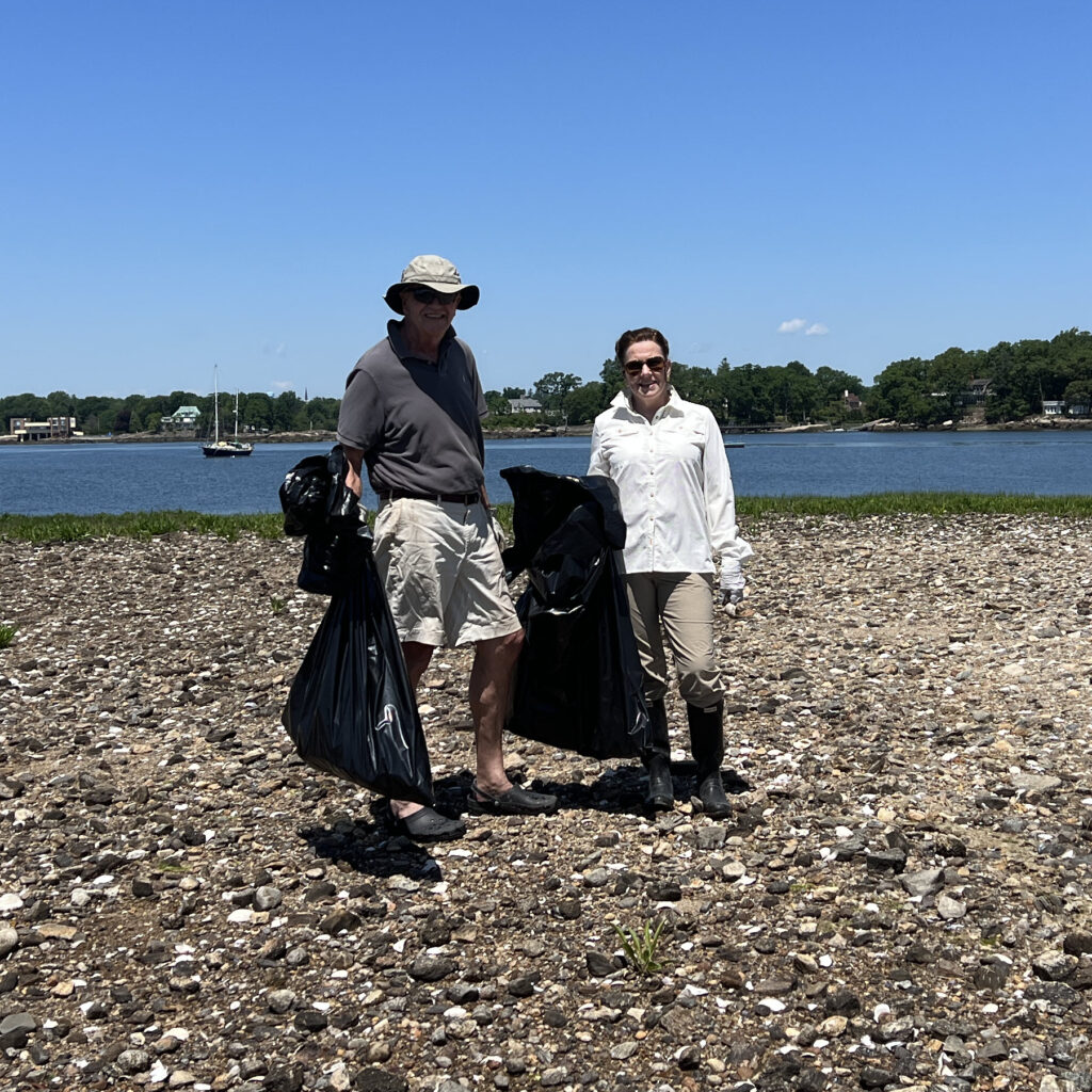 (PHOTO: Konrad Wos and Meggan Walsh on Hen Island cleanup duty.)