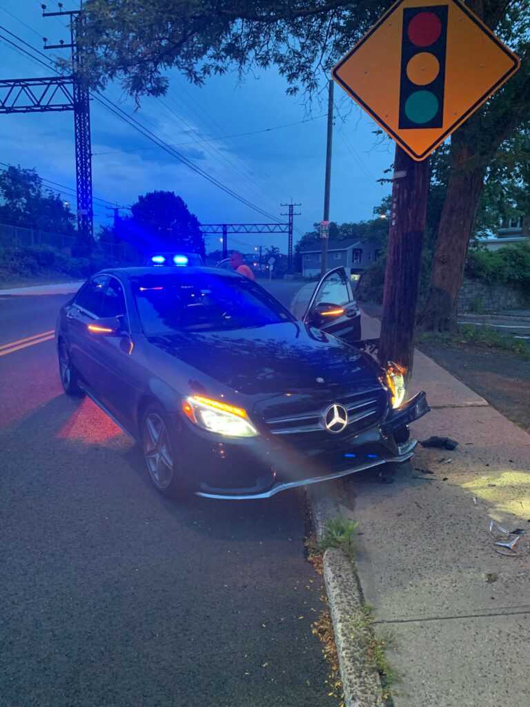 (PHOTO: Rye PD responded to a report of this Mercedes colliding with a telephone pole in the early hours of July 2, 2022. The driver, Daniel Gomez-Ayora, age 37, of West Haven, Connecticut, was arrested for DWI.)