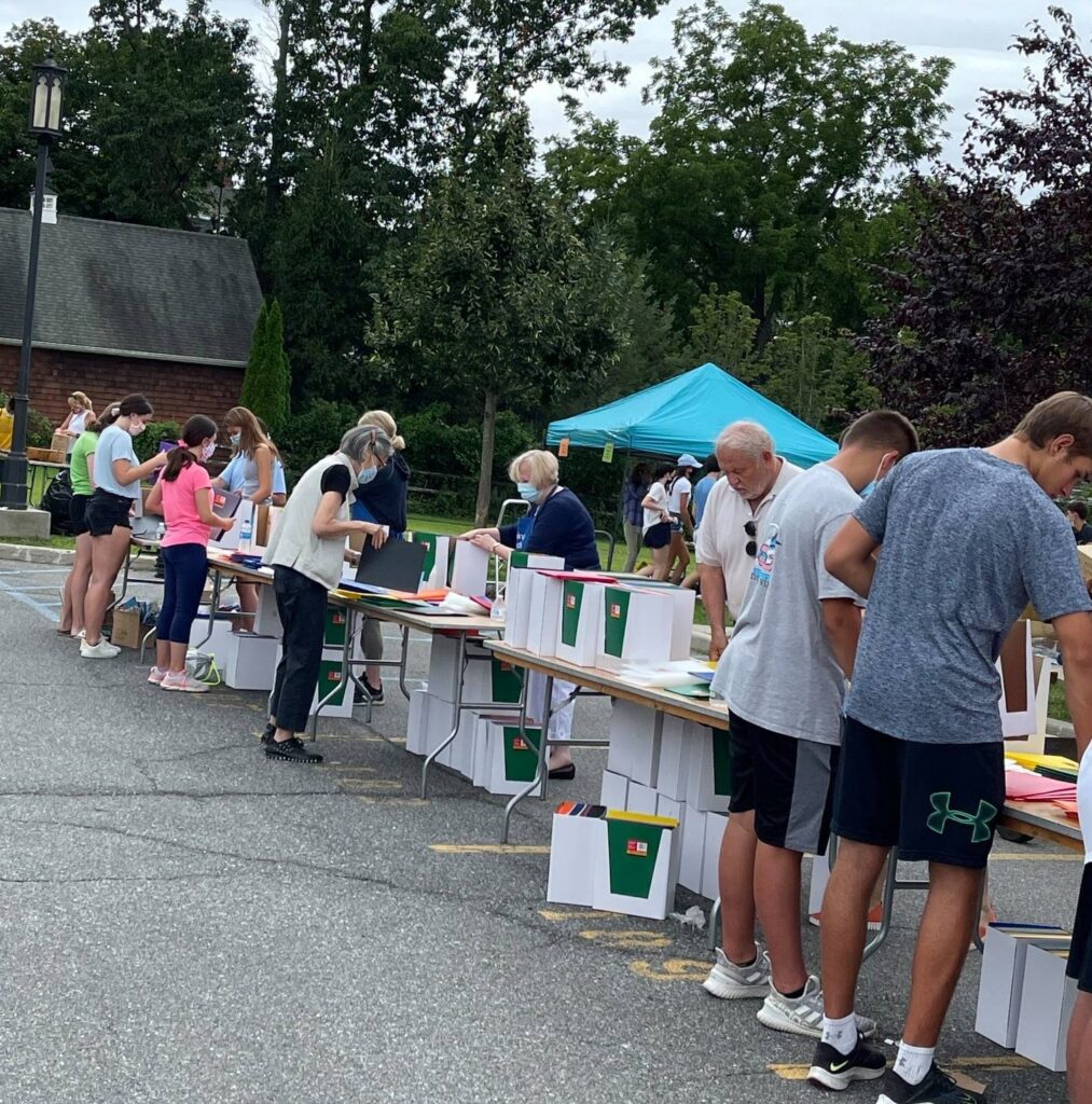 (PHOTO: The Helping Hands Mission Backpack supply line.)