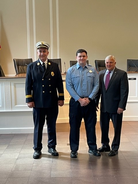 (PHOTO: Rye FD Captain John McDwyer, Firefighter William Junior, and Public Safety Commissioner Mike Kopy.)