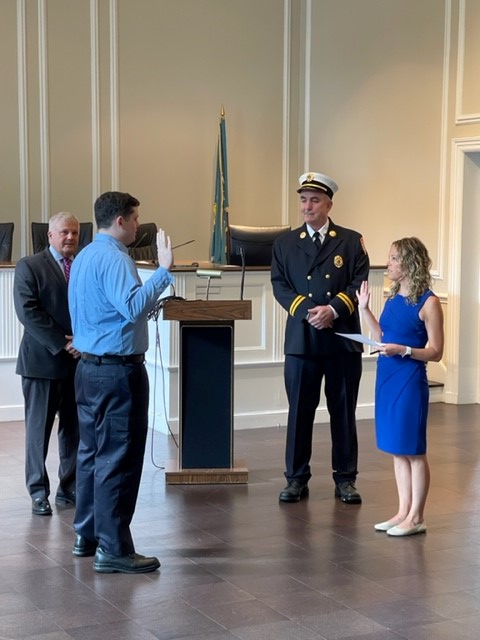 (PHOTO: Rye's newest firefighter, William Junior, was sworn in by Carolyn D'Andrea, Esq. at thee Rye City Hall Ceremony on Monday, August 29, 2022.)