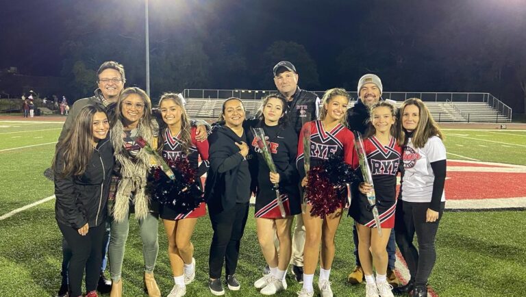 (PHOTO: It was senior night for Rye Girls Varsity Cheerleading on Friday evening, September 23, 2022.)